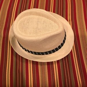 Straw fedora with black and white polka dot band